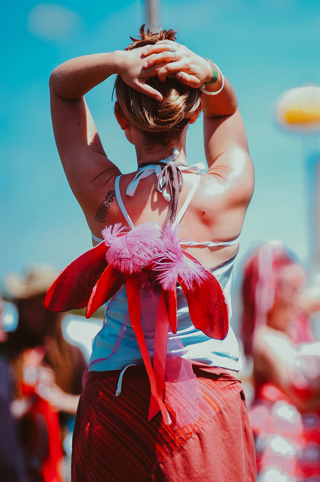 A festival goer enjoys Glastonbury Festival