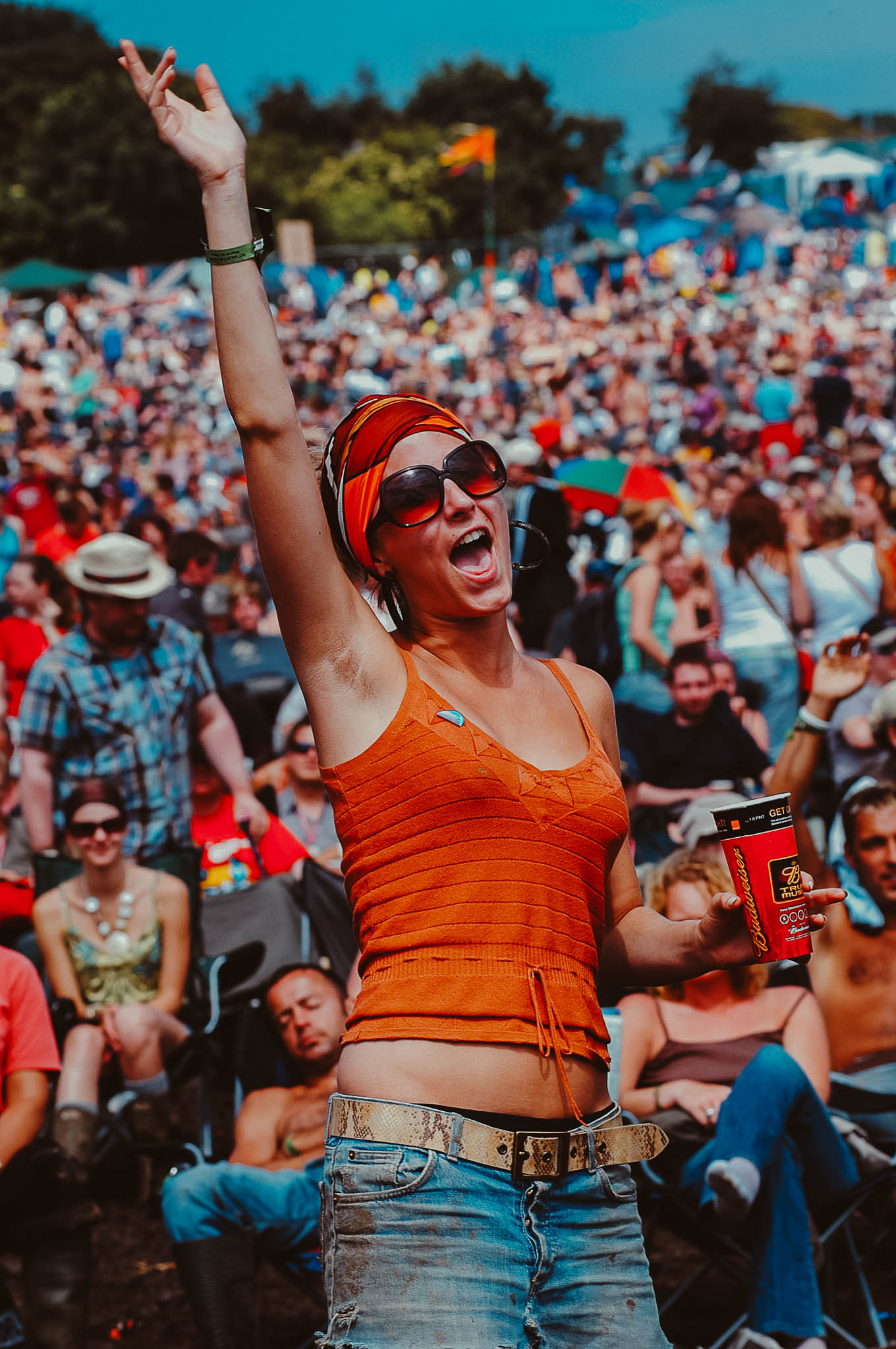 The sun comes out at Glastonbury Festival. Picture shows a girl dancing to Jools Holland on the Pyramid stage in the su