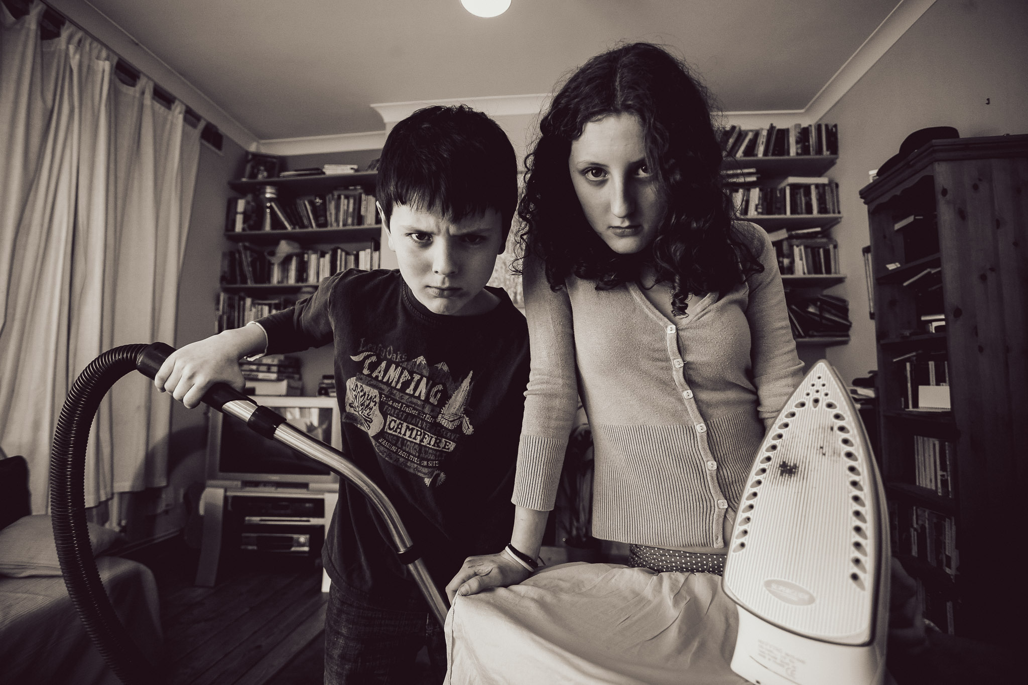 Kitty (13yrs) and Rory (11yrs) doing the household chores at their London home