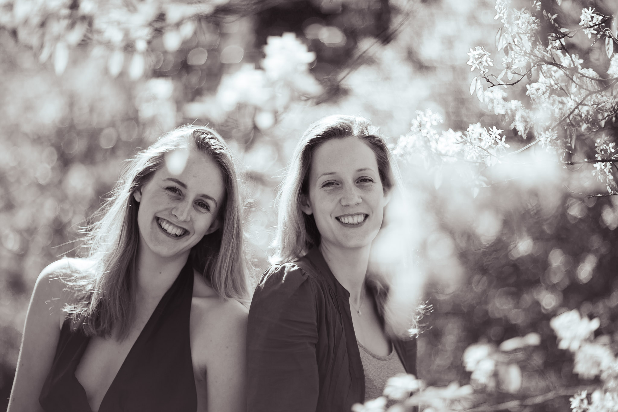 Natural light portraits of two sisters in Wymondham, Norfolk; a relaxed, fun commissioned outdoor session.