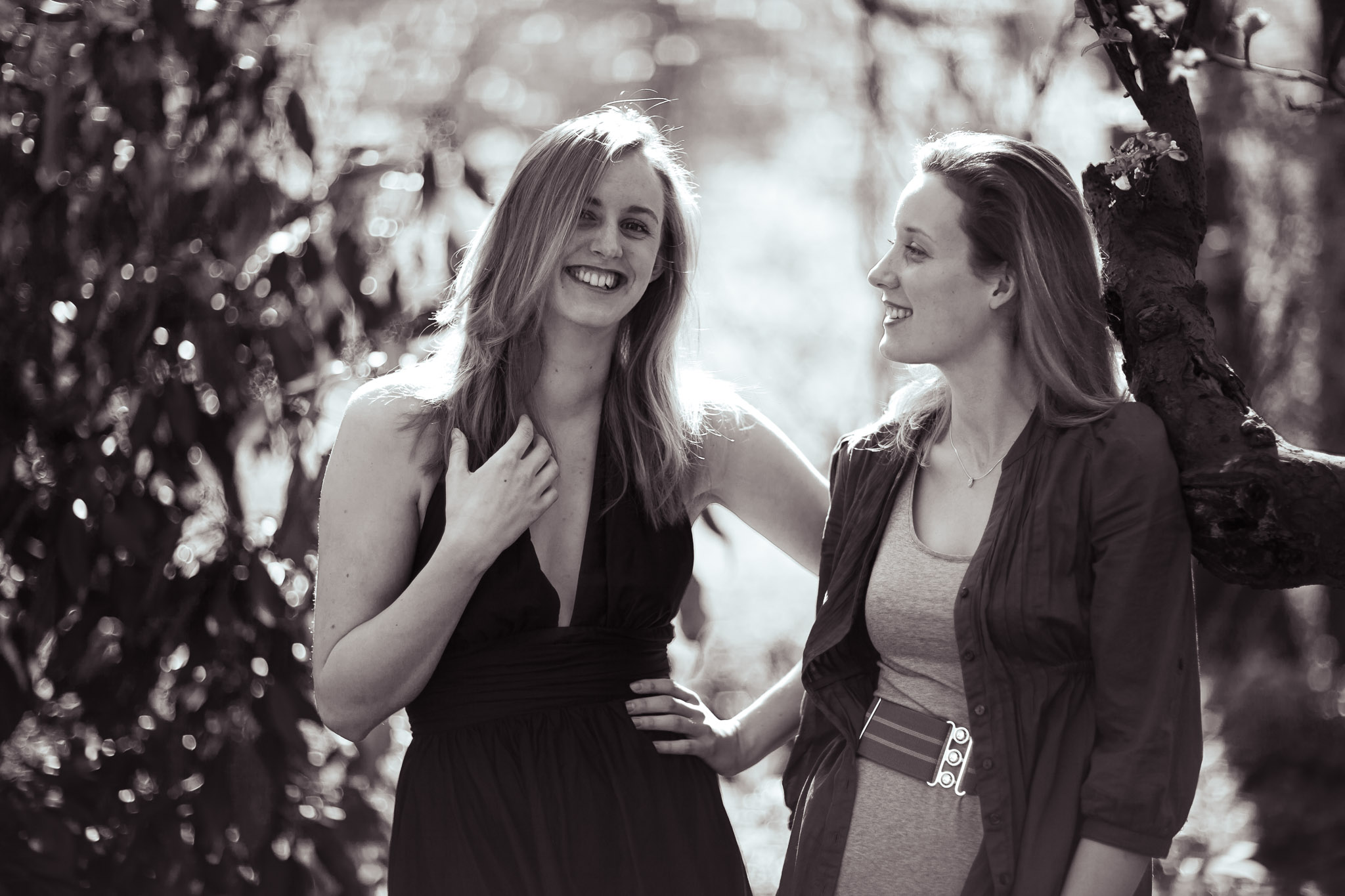 Natural light portraits of two sisters in Wymondham, Norfolk; a relaxed, fun commissioned outdoor session.