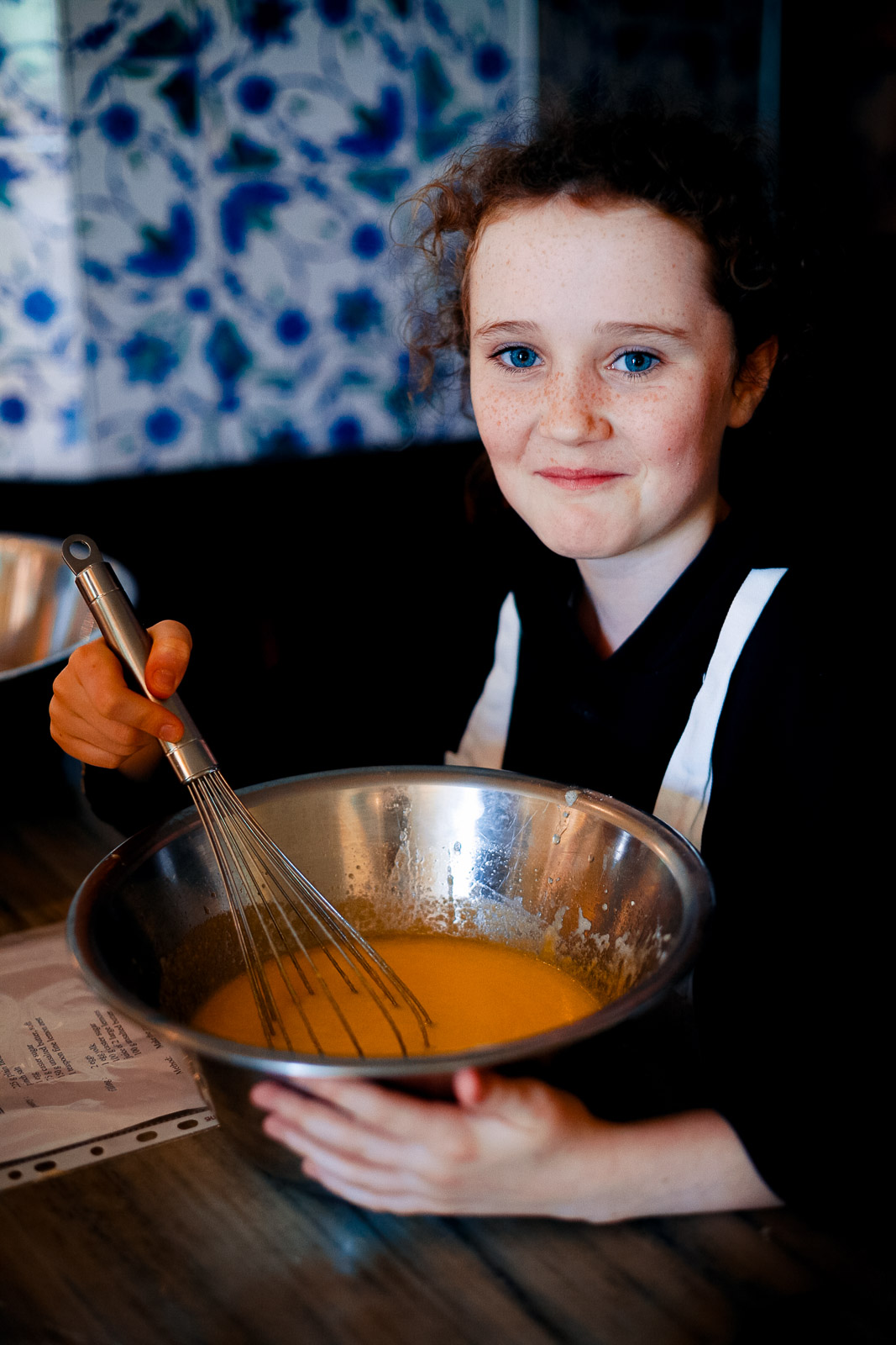 Teenagers learning cookery skills at Amici Bar & Italian Kitchen, South London